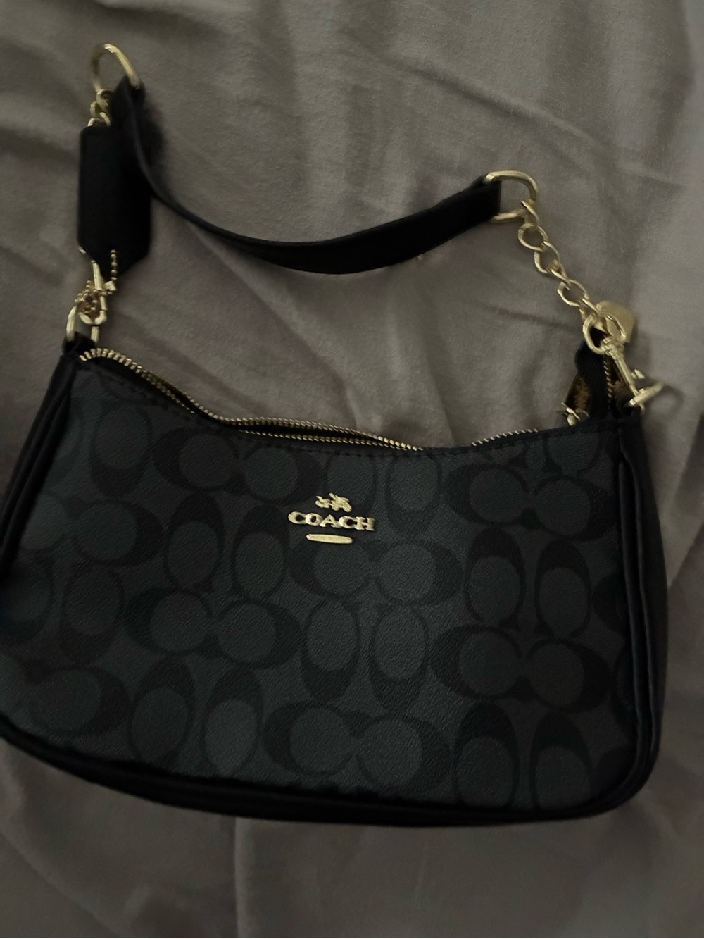 Coach Black Signature Canvas Shoulder Bag with Gold Hardware Accent